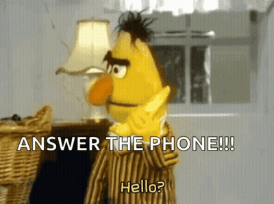 Bert From Sesame Street Says " Answer The Phone Hello " GIF