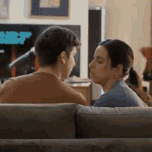 Beso On The Couch By The TV GIF
