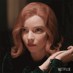 Beth Harmon Demure Smile GIF