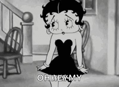 Betty Boop Sitting On Chair In Black Dress GIF