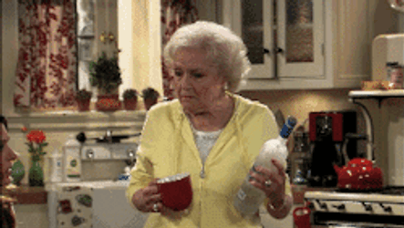 Betty White Pours Two Shots Of Vodka GIF