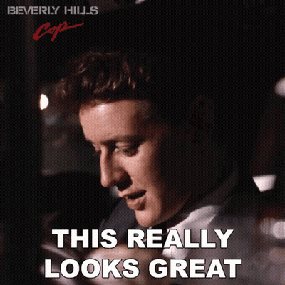 Beverly Hills Cop Poster With Man In Suit GIF