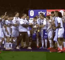 Bielsa Raises Trophy With Team GIF