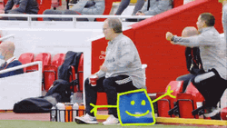 Bielsa Sitting Happily With Colleagues GIF