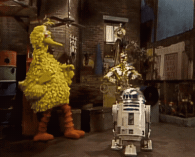 Big Bird And R2D2 Standing Together GIF
