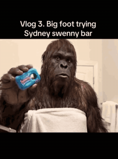 Big Foot Holding Sydney Sweenny Bar GIF