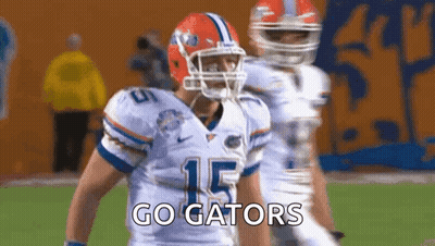 Big Football Player In Red And White Uniform GIF
