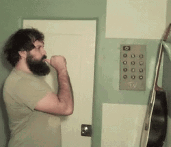 Big Head Man Sucking His Finger GIF