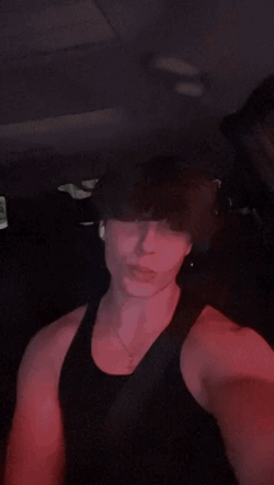 Big Man In The Dark Flexing Mewing Meme GIF