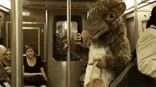 Big Mascot Rat Take Subway GIF