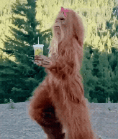 Bigfoot Holding Lemonade With Pink Headband GIF