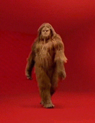 Bigfoot Walking Across Red Surface GIF