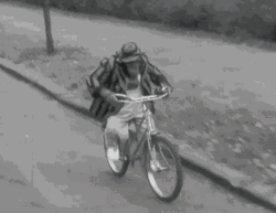 Bike Riding Monkey Vintage Footage GIF