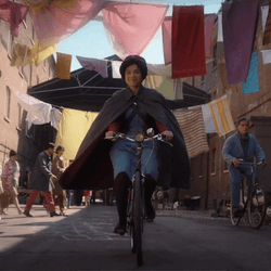 Biking Adventure In Cobblestone Alley GIF