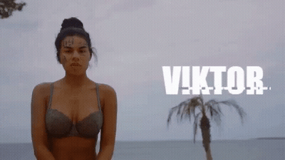 Bikini Woman With Face Tattoo Near Palm Tree GIF