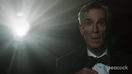 Bill Nye Eating Popcorn While Watching Drama GIF