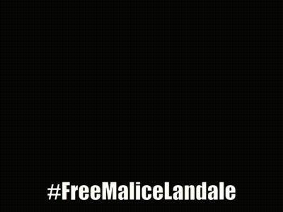Billboard With Woman Saying #FreeMaliceLandale GIF