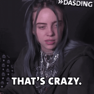Billie Eilish In Black Jacket And Necklaces Saying That's Crazy GIF