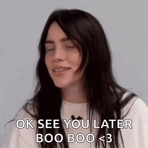Billie Eilish Is Smiling And Saying `` Ok See You Later Boo Boo < 3 '' With Her Eyes Closed . GIF