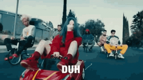 Billie Eilish Sitting In Red Car With Others GIF