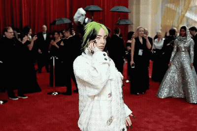 Billie Eilish Talking On Phone At Oscars GIF