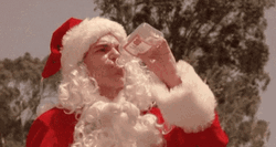 Billy Bob Thornton Drunk Santa Throwing Bottle GIF