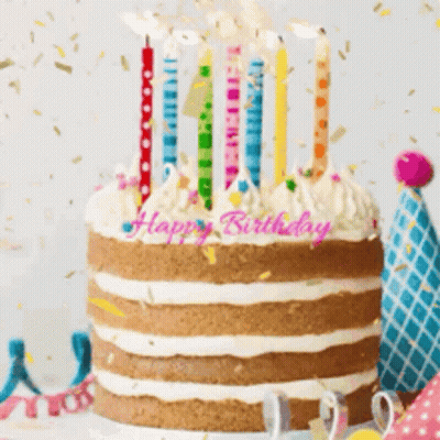 Birthday Cake With Candles And Confetti Saying Happy Birthday GIF