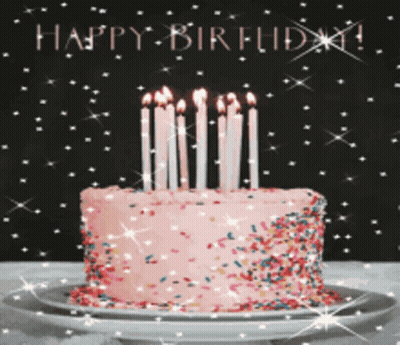 Birthday Cake With Candles And Sprinkles Saying Happy Birthday GIF
