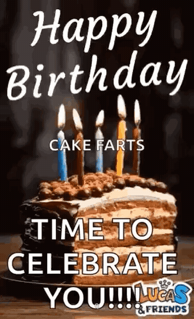 Birthday Cake With Candles on Wooden Table