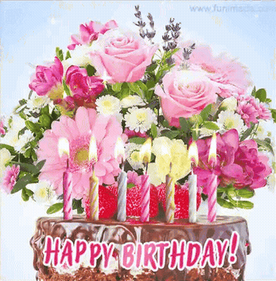 Birthday Cake With Pink Candles And Pink And White Flowers GIF