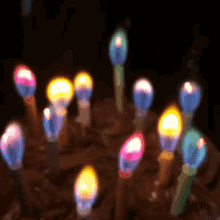 Birthday Candles With Colorful Flames GIF