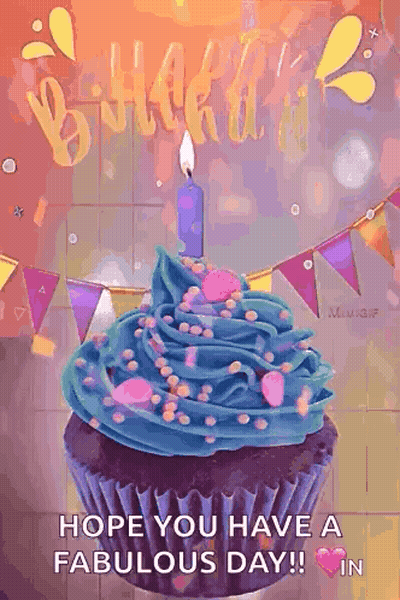 Birthday Cupcake With Blue Frosting And Lit Candle GIF