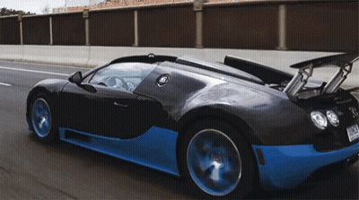 Black And Blue Sports Car With License NCJ-587 GIF