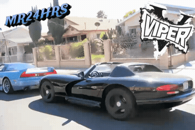 Black And Blue Sports Cars With Viper Sign GIF