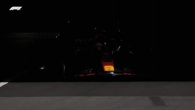 Black And Orange Race Car With Letter F GIF