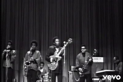Black And White Band On Stage With Vevo GIF
