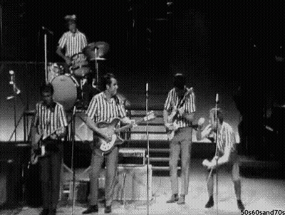 Black And White Band Playing On Stage GIF