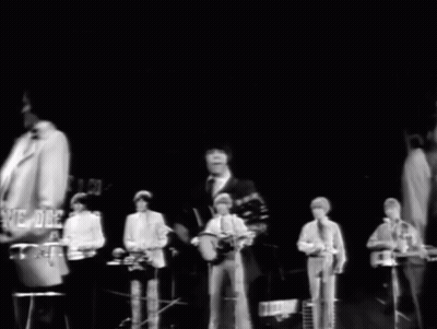 Black And White Band With Sign Saying We Are GIF