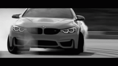 Black And White BMW Driving On Road GIF
