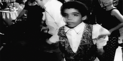 Black And White Boy Dancing In Crowd GIF