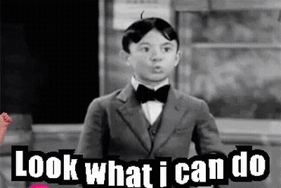 Black And White Boy In Suit And Bow Tie Saying Look What I Can Do GIF