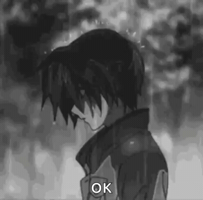 Black and White Boy Standing in Rain Saying Ok