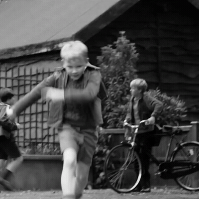 Black And White Boys Carrying On Shoulders GIF