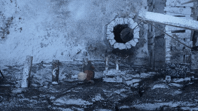 Black And White Brick Wall With Hole GIF