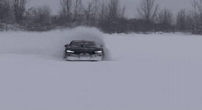 Black And White Bugatti Chiron Driving In Snow GIF