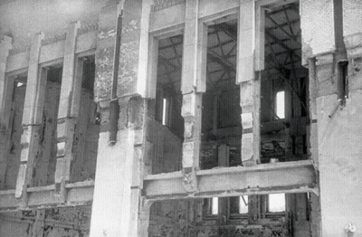 Black And White Building With Few Windows GIF