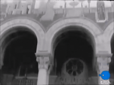 Black And White Building With Letters E.O.A GIF