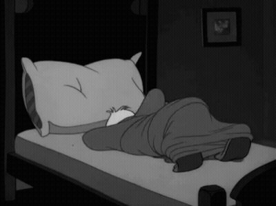 Black And White Cartoon Person Laying On Bed With Pillow And Blanket GIF