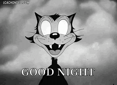 Black And White Cat With Glowing Eyes Saying Good Night GIF
