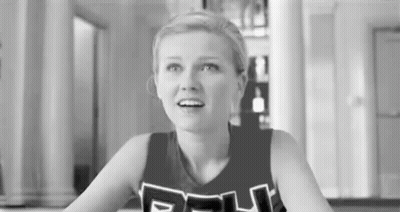Black And White Cheerleader In Uniform GIF